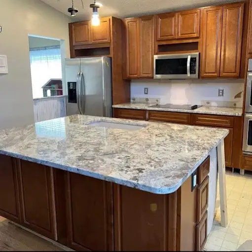 Granite Island Wood Cabinetry project completed by Venet LLC in Tampa Bay, Florida