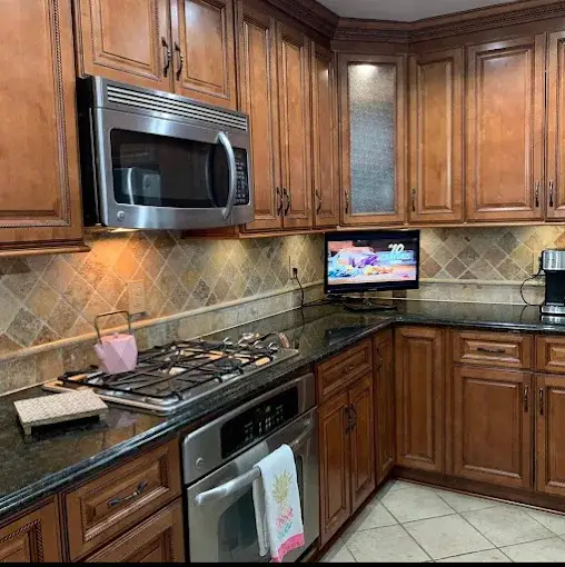 Granite Countertops Wood Kitchen project completed by Venet LLC in Tampa Bay, Florida