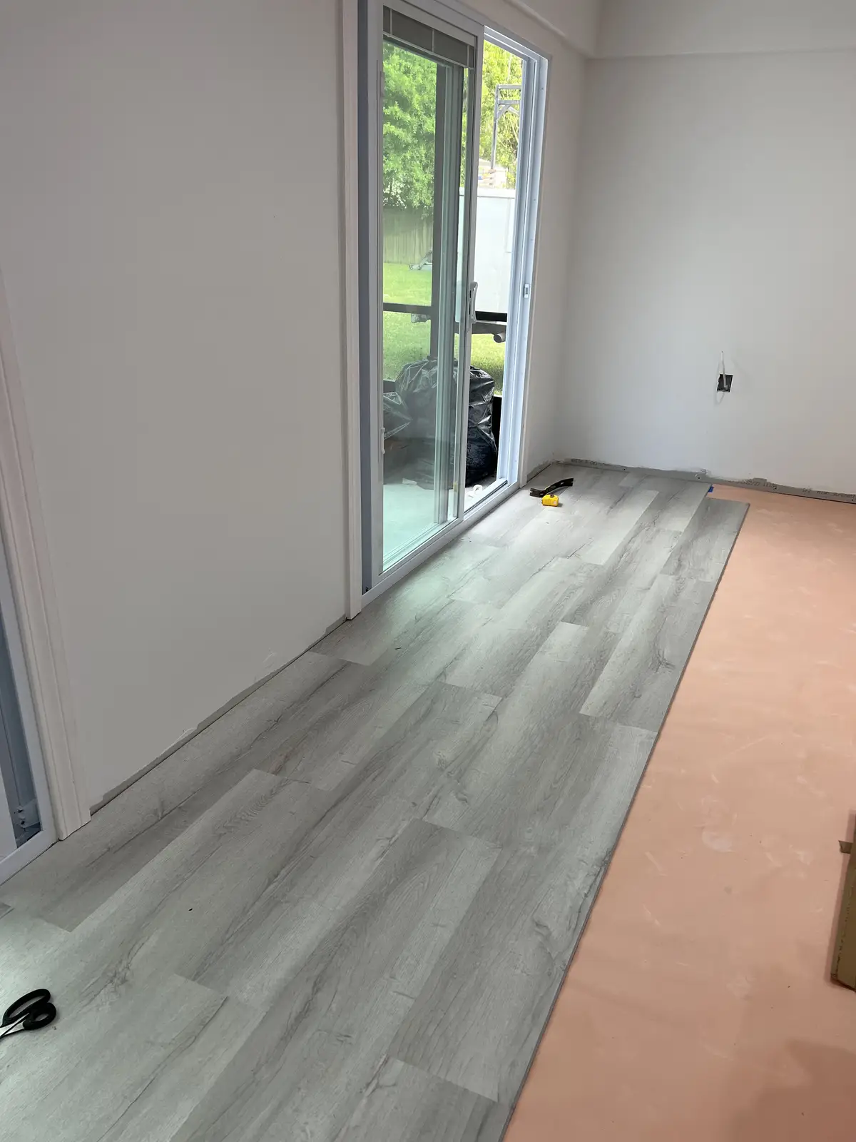 Luxury vinyl plank flooring installation in progress by Venet LLC in Tampa Bay, Florida