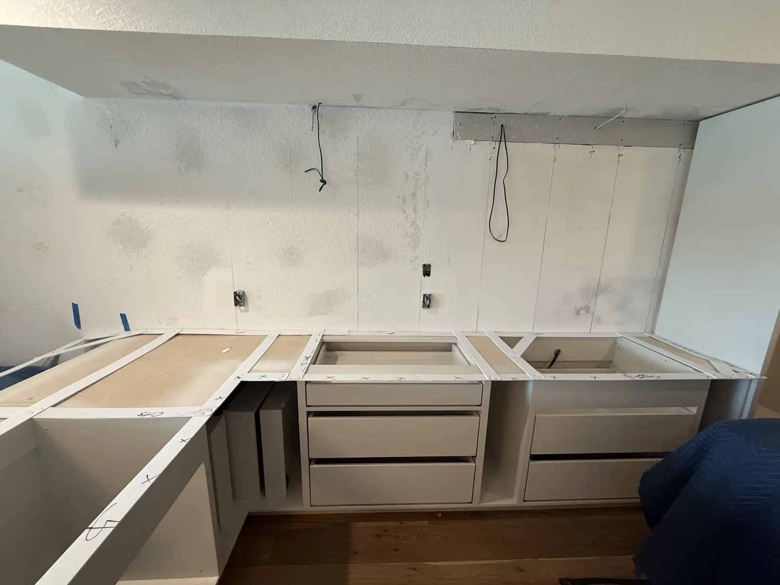 Base cabinet installation during a kitchen remodel by Venet LLC in Tampa Bay, Florida