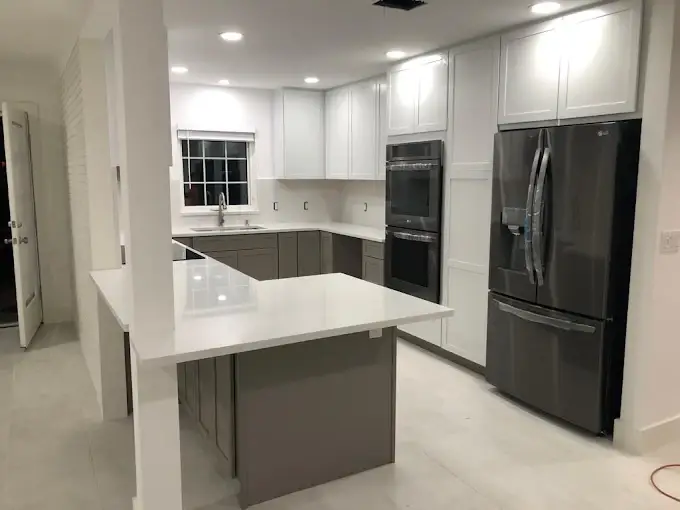 Quartz Countertops Gray Cabinetry project completed by Venet LLC in Tampa Bay, Florida
