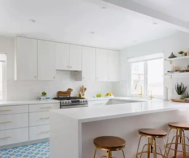New white kitchen island build and remodel with custom stone countertops by Venet LLC