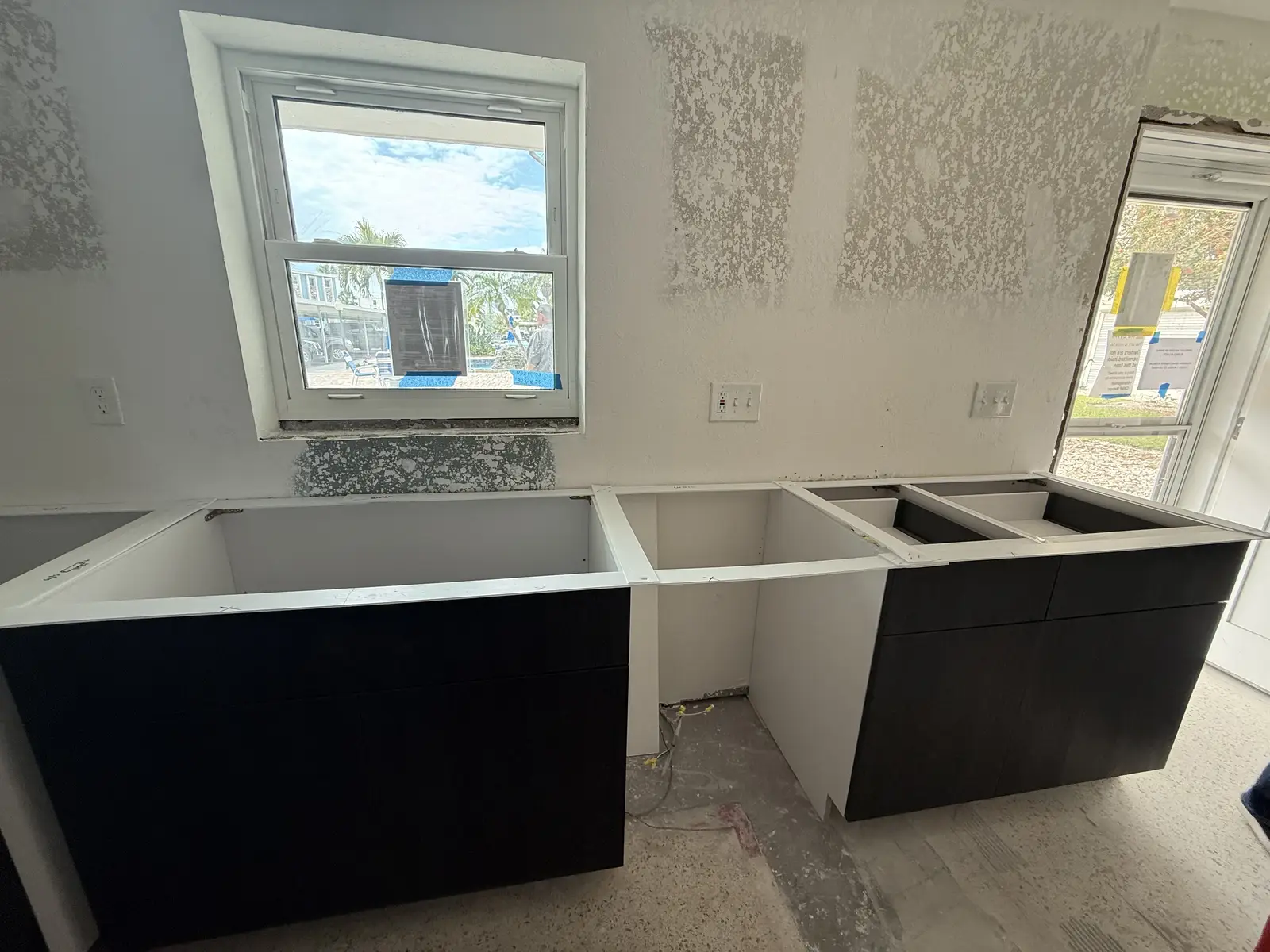 Black base cabinets set for countertop templating by Venet LLC in Tampa Bay, Florida