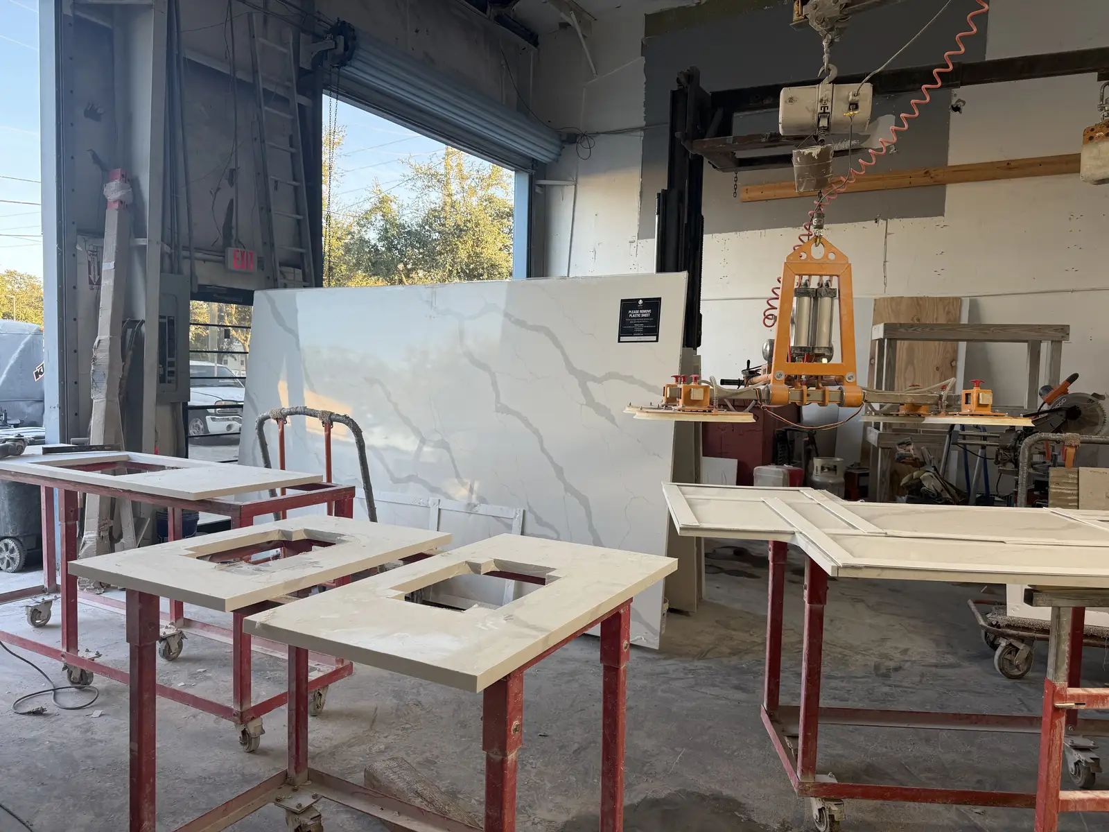 Countertop fabrication with sink cutouts in the Venet LLC shop, Tampa Bay, Florida